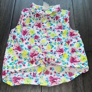 Girl, floral sleeveless button down, collared high low crop front tie shirt